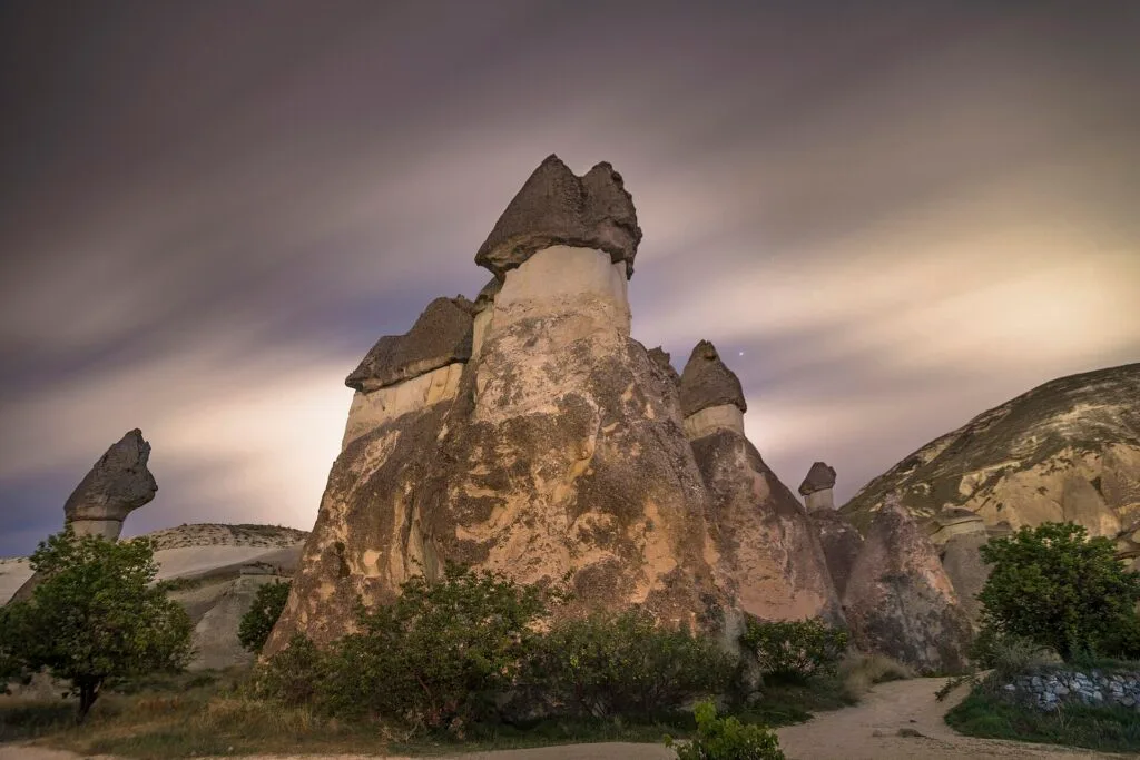 Tall fairy chimneys with conical caps standing in Pasabag (Monks Valley), Cappadocia