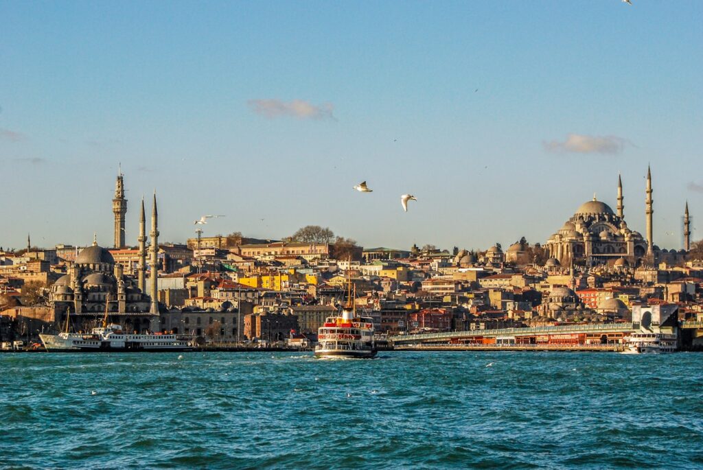 Istanbul skyline at sunset with the Blue Mosque and Bosphorus strait from across the water