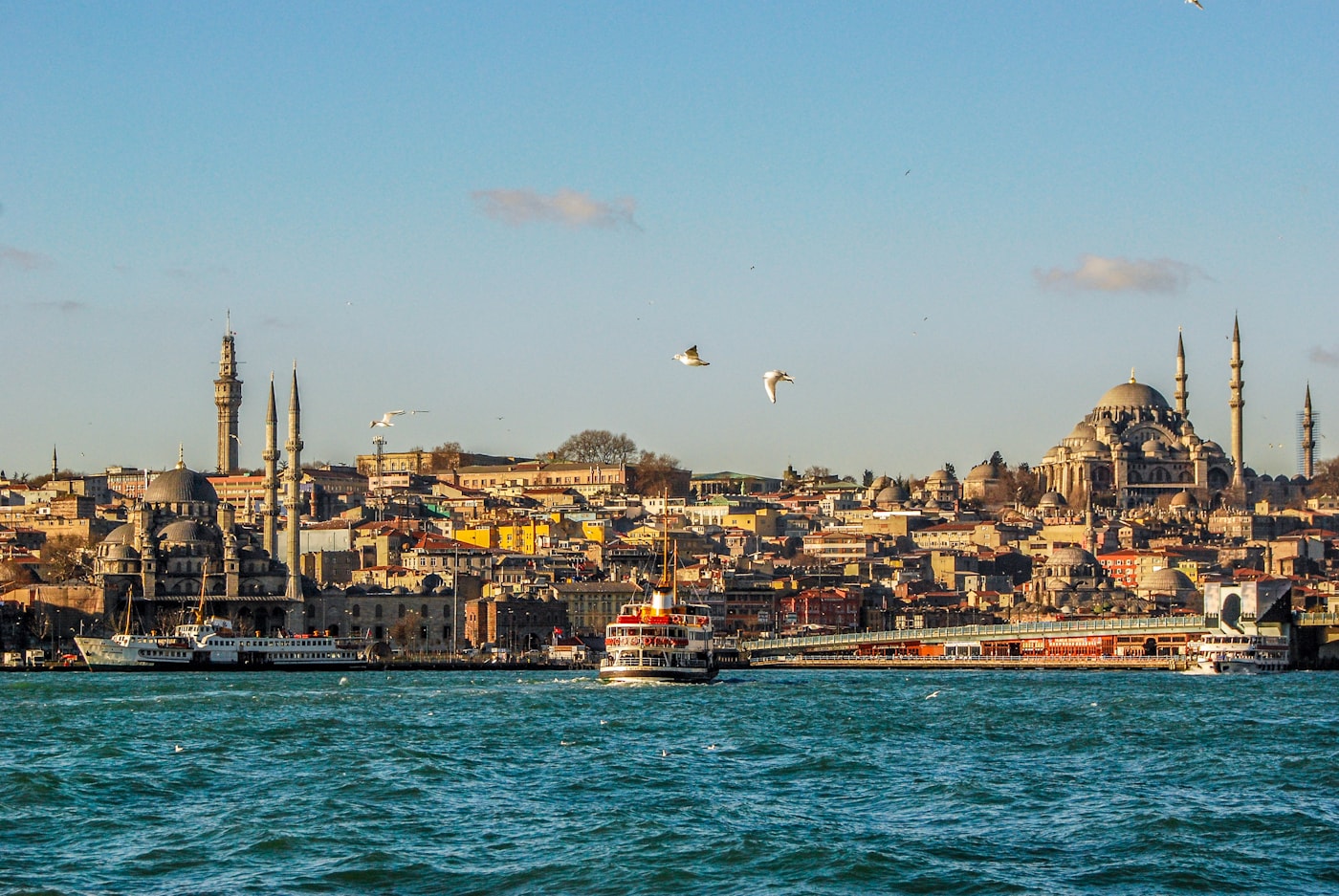 Istanbul skyline at sunset with the Blue Mosque and Bosphorus strait from across the water