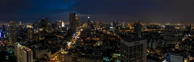 The Bangkok skyline stretching to the horizon at dusk, Thailand