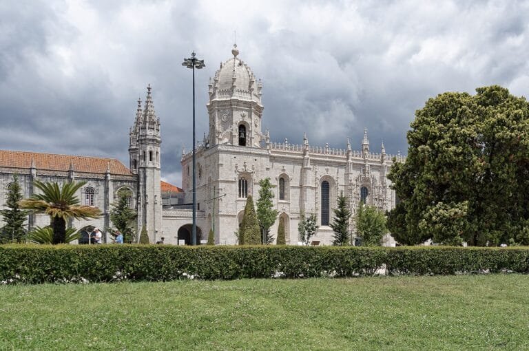 The Jeronimos Monastery behind its lawns in Belem, Lisbon, Portugal