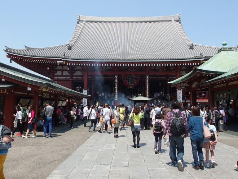 Crowds and the incense burner in front of the Senso-ji main hall in Asakusa, Tokyo