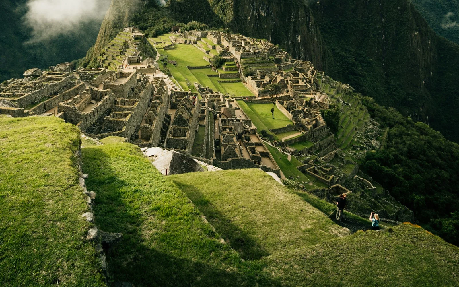 The Inca citadel of Machu Picchu wreathed in Andean mist, Peru