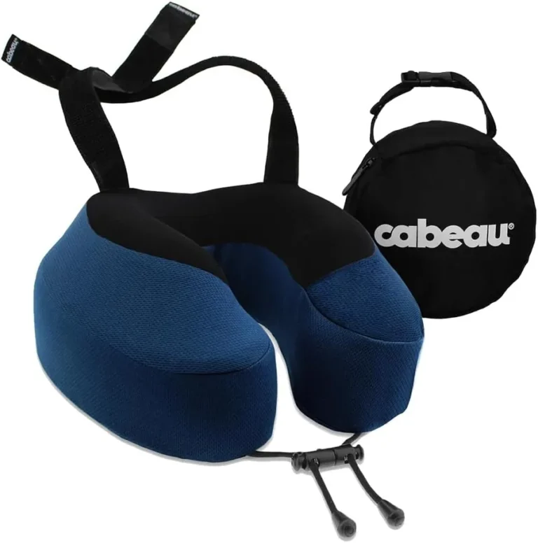 Cabeau Evolution S3 travel pillow in blue with a black front panel and its round zip carry case.