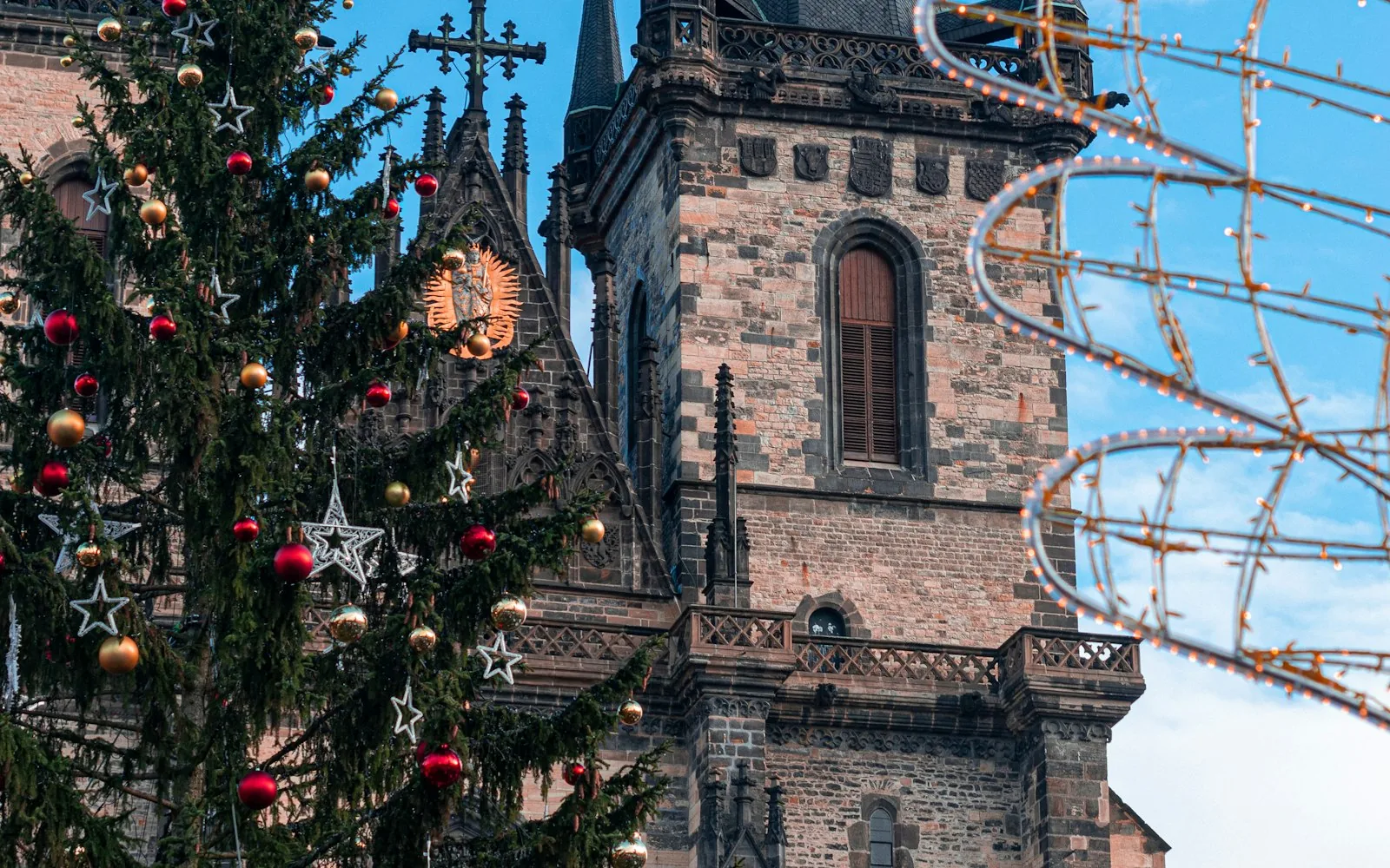 A Christmas tree below the Tyn Church on Prague's Old Town Square, Czech Republic