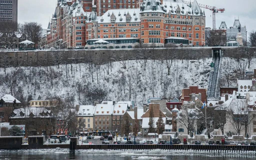 The Chateau Frontenac above snow-covered Quebec City in winter, Canada