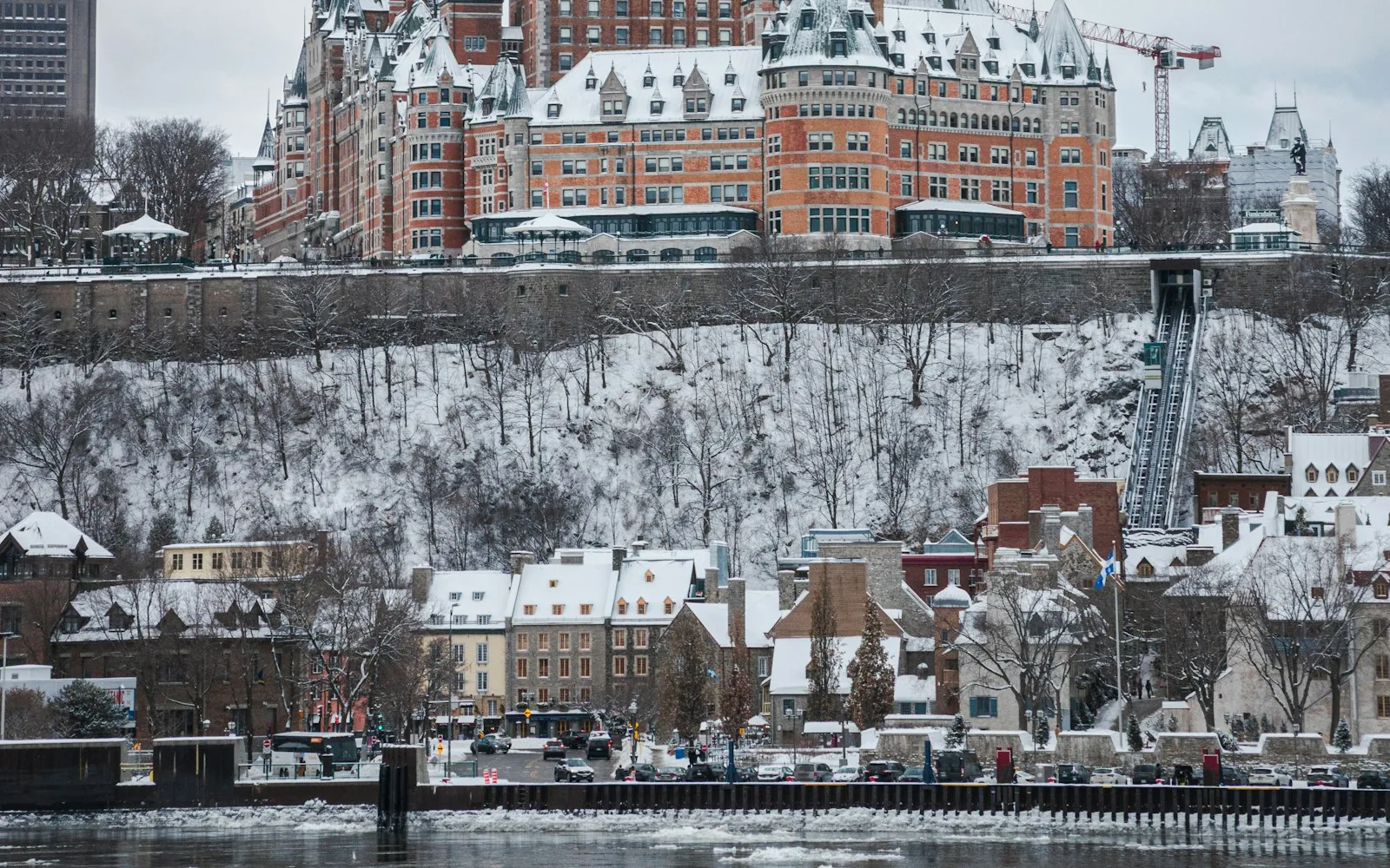 The Chateau Frontenac above snow-covered Quebec City in winter, Canada