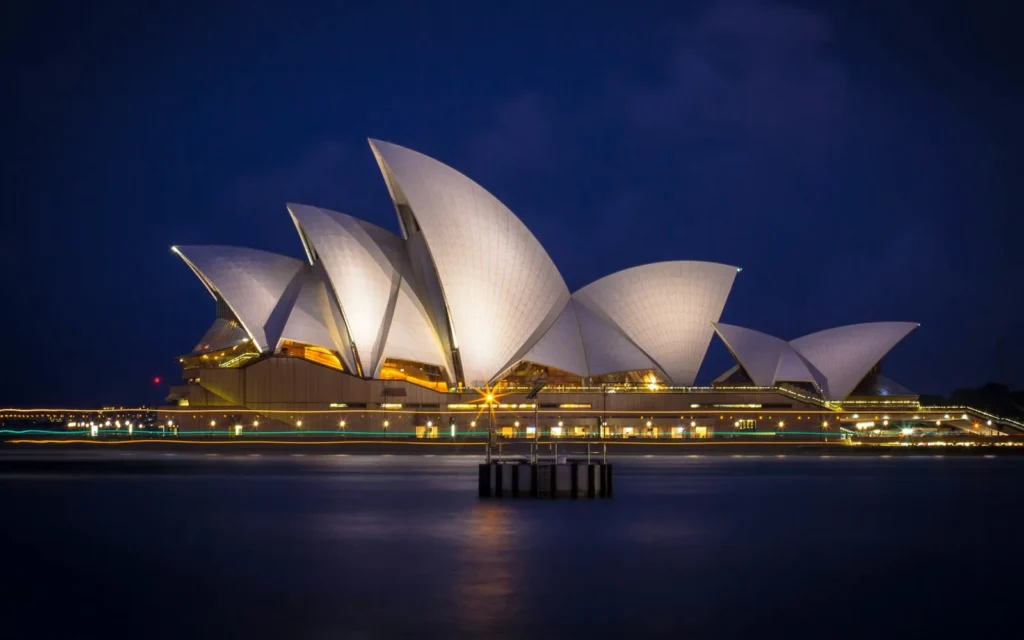 The Sydney Opera House lit up on a summer evening, Australia