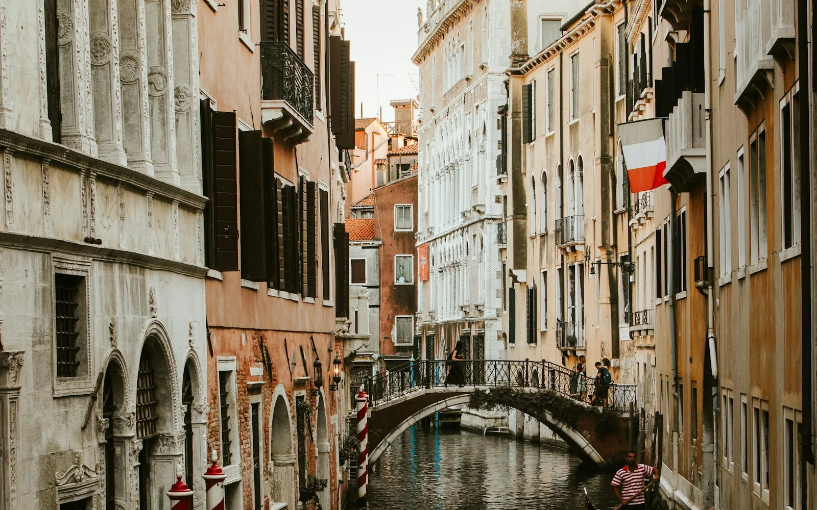A gondola on a narrow canal in Venice, Italy
