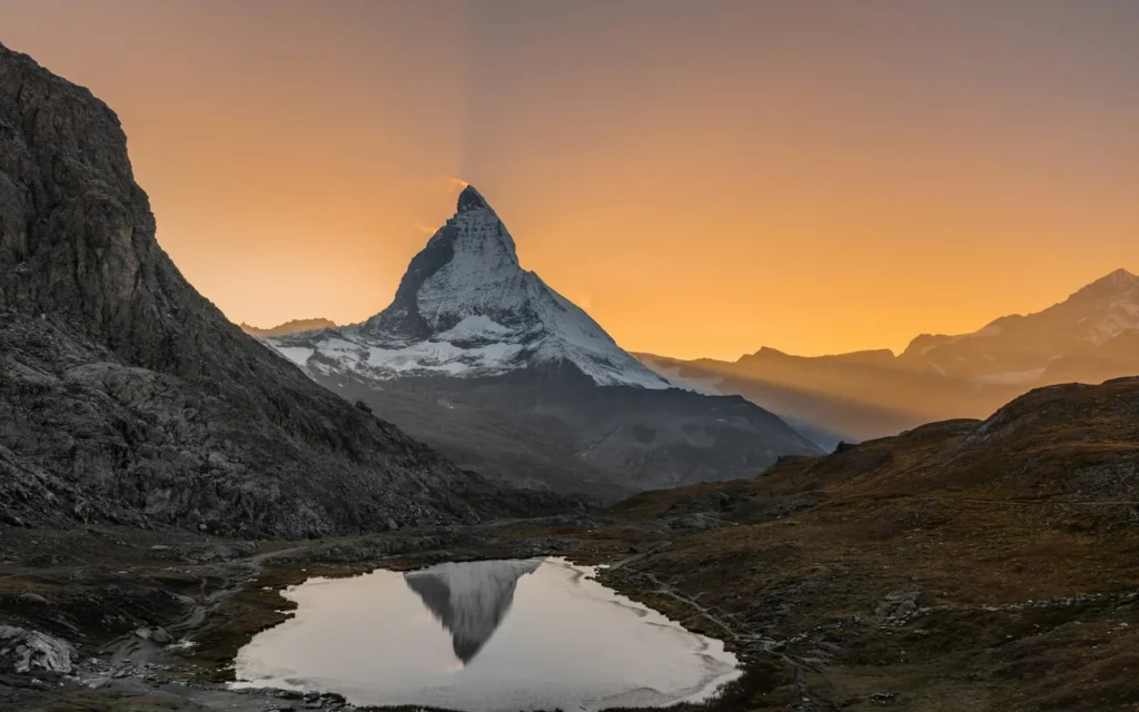 The Matterhorn reflected in an alpine lake above Zermatt, Switzerland