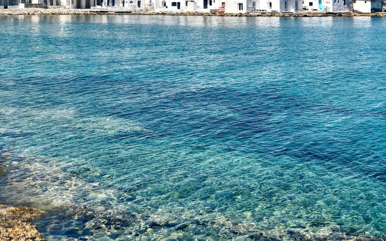 The whitewashed waterfront of Naoussa on Paros, Greece