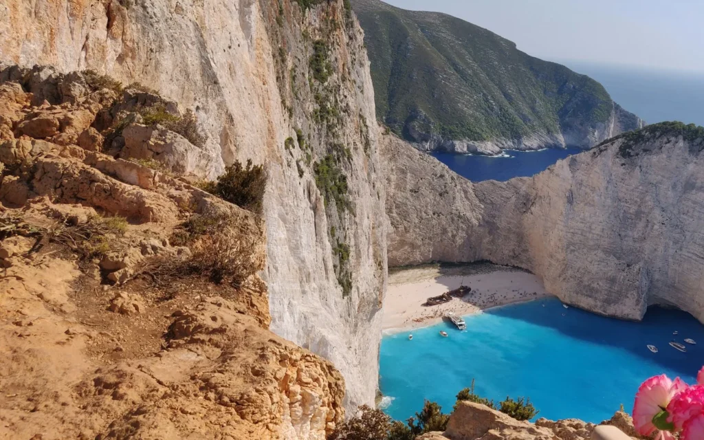 Navagio shipwreck beach beneath white cliffs on Zakynthos, Greece