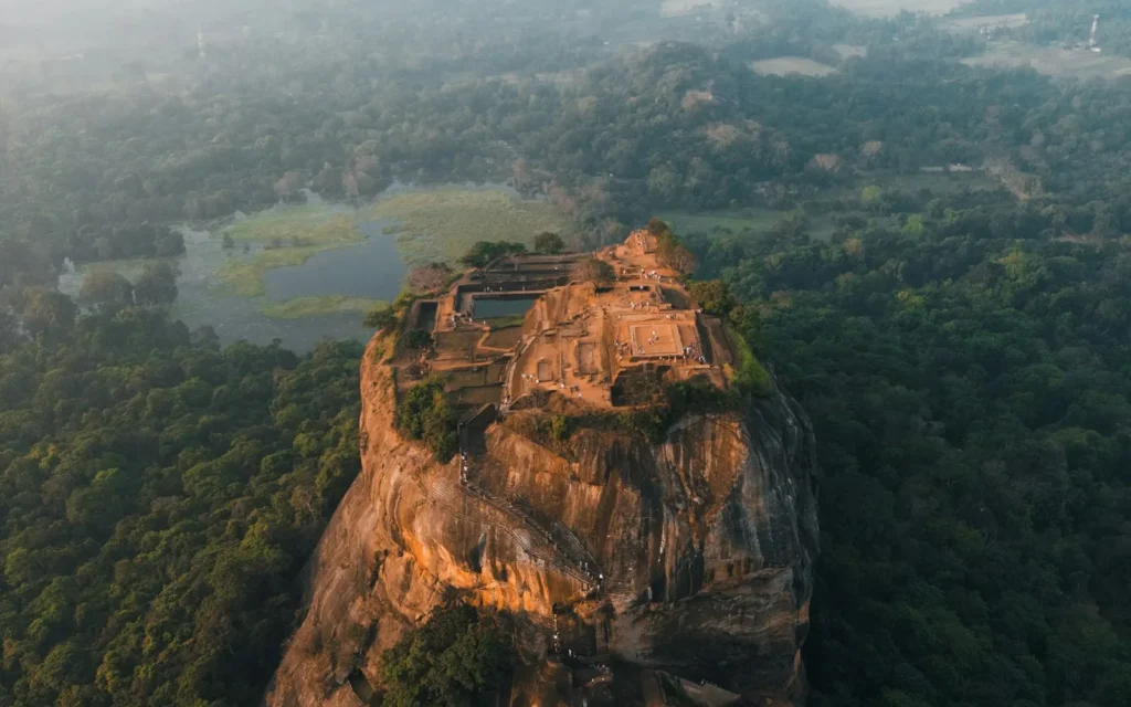 The ancient rock fortress of Sigiriya rising above the jungle, Sri Lanka
