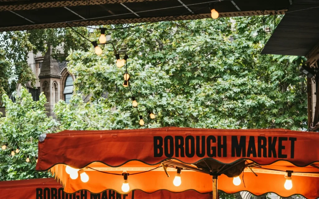 Food stalls under the arches of Borough Market in London
