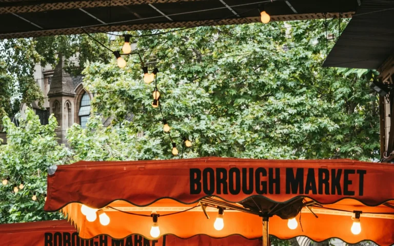 Food stalls under the arches of Borough Market in London