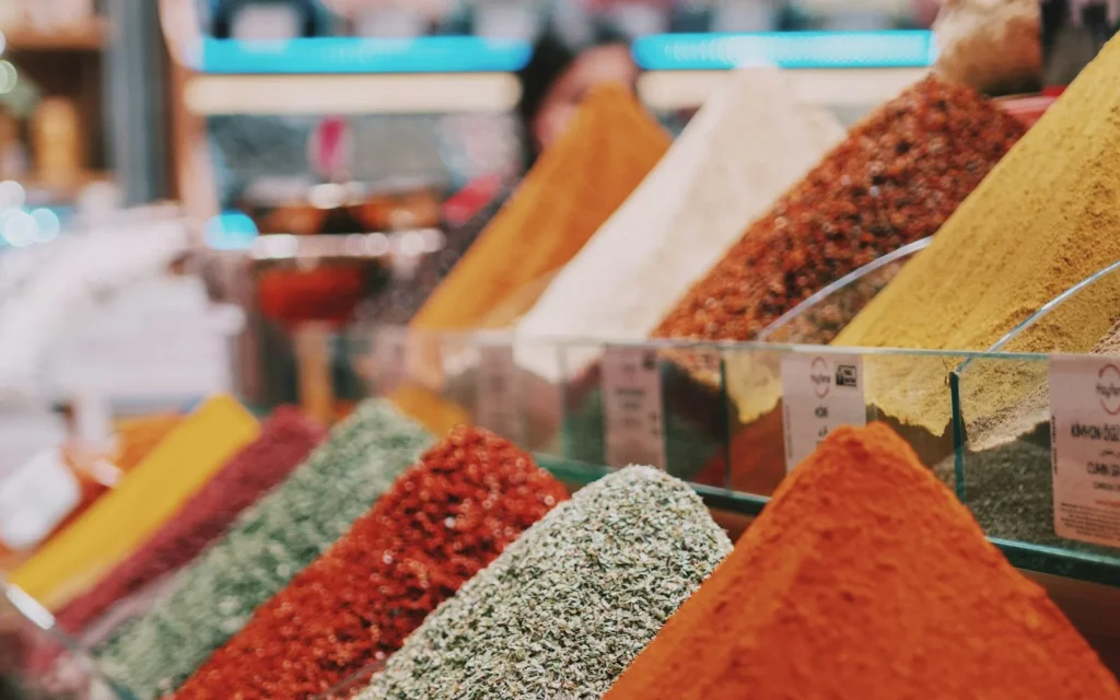 Mounds of coloured spices on sale in an Istanbul bazaar