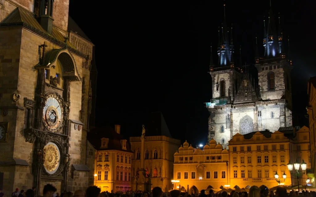 Prague's Old Town Square and astronomical clock illuminated at night, Czech Republic