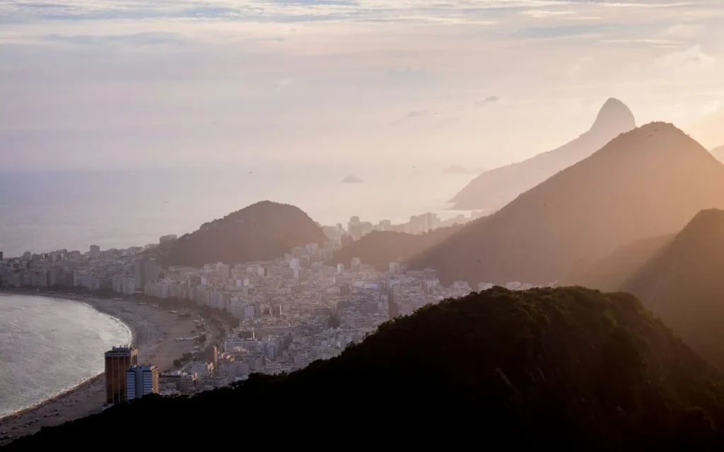 Rio de Janeiro's Copacabana beach and mountains at golden hour, Brazil