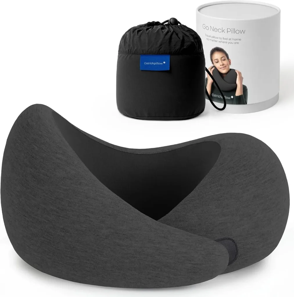 Ostrichpillow GO travel pillow in charcoal memory foam with its black carry case and retail box.