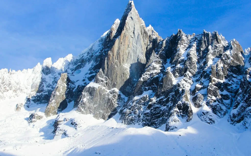 Snow-covered granite spires above Chamonix in the French Alps