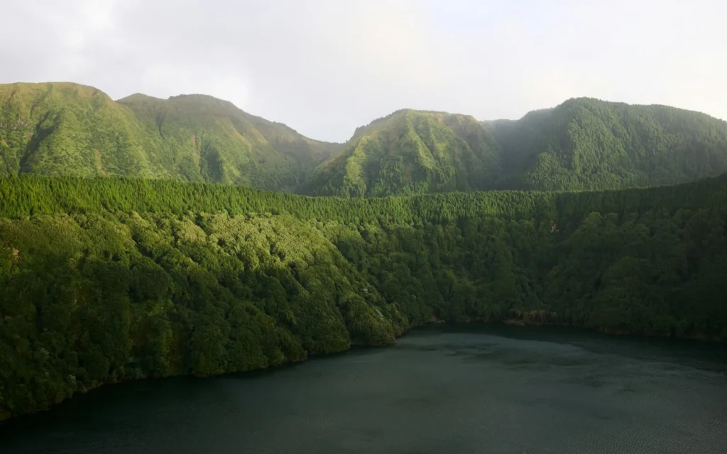 A green volcanic crater lake in the Azores, Portugal