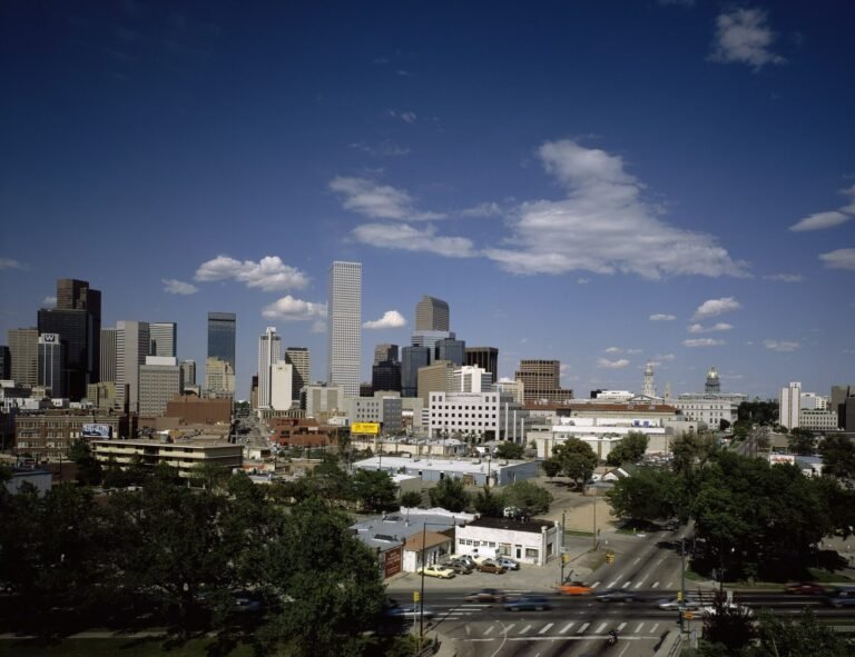 Downtown Denver skyline under a blue Colorado sky