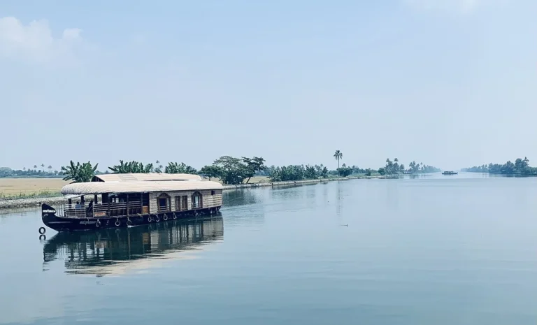A traditional houseboat on the wide Kerala backwaters near Alleppey, India