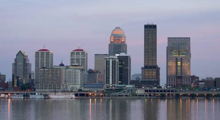 The downtown Louisville skyline seen across the Ohio River at dusk