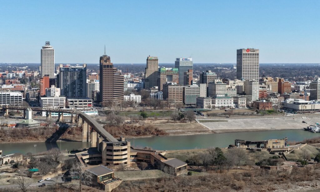 The Memphis skyline above the Mississippi River with the old bridge approach in the foreground