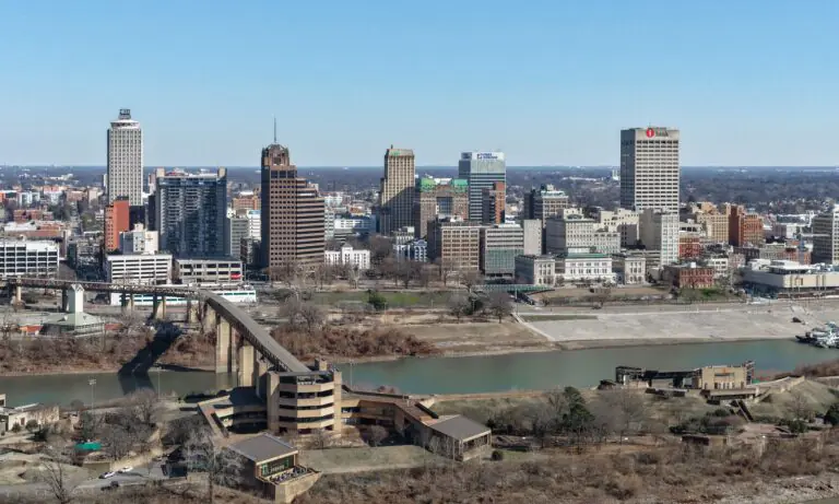 The Memphis skyline above the Mississippi River with the old bridge approach in the foreground