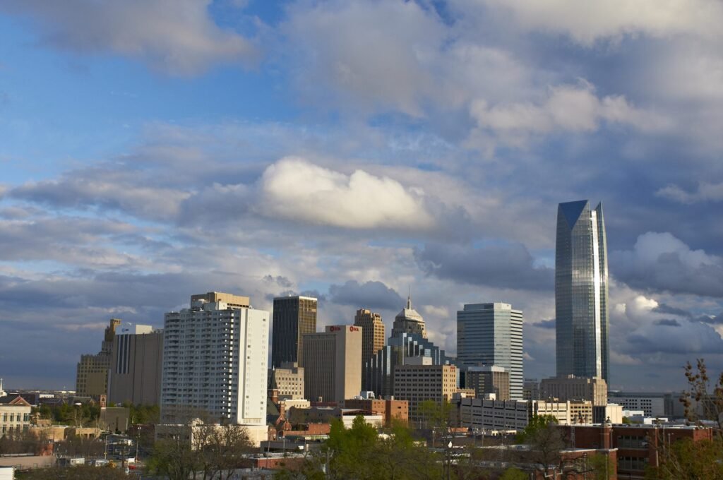 Downtown Oklahoma City with the Devon Tower rising at right under broken cloud