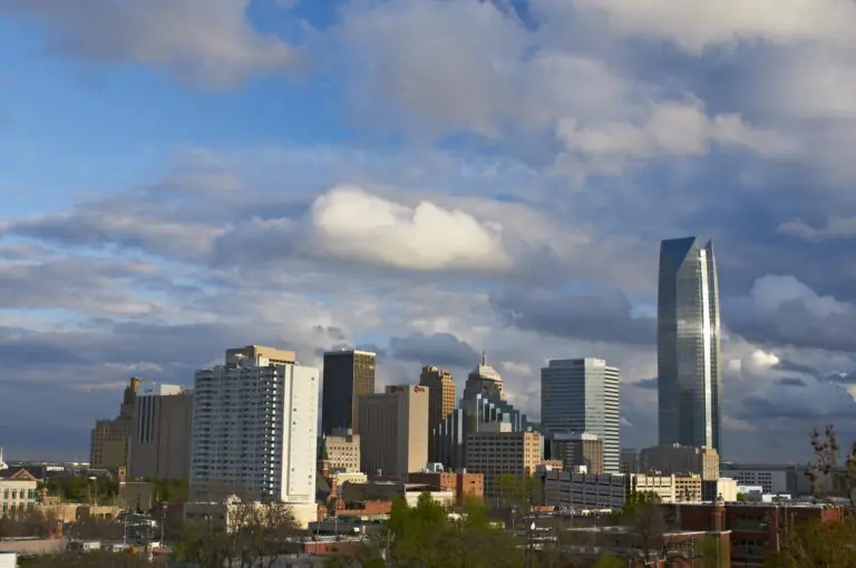 Downtown Oklahoma City with the Devon Tower rising at right under broken cloud