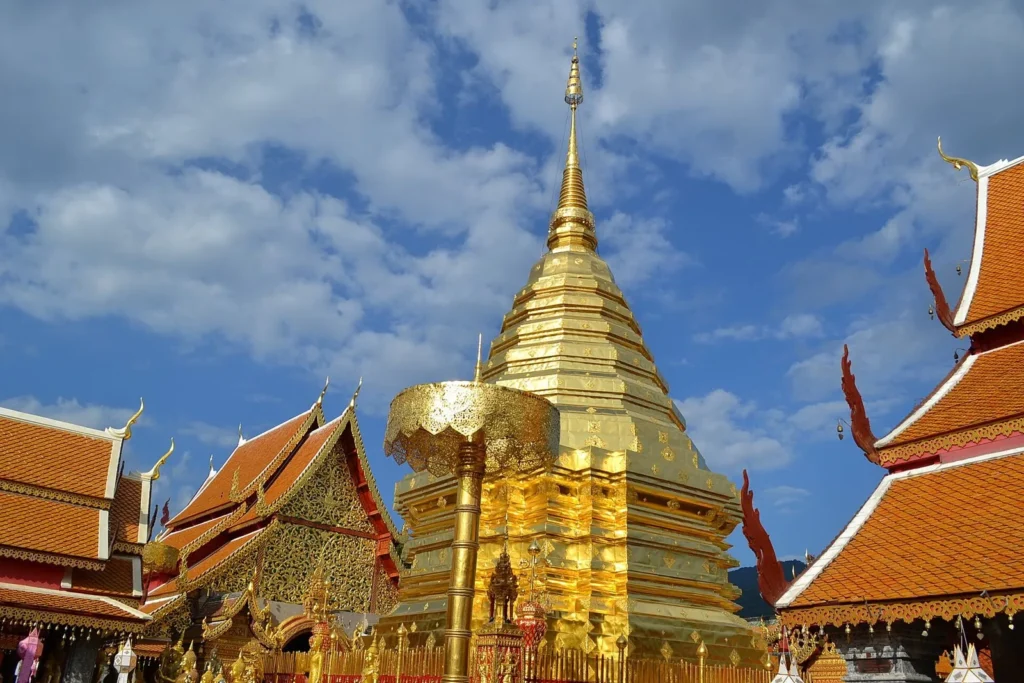 Gilded chedi and orange-tiled temple roofs at Wat Phra That Doi Suthep, Chiang Mai, Thailand